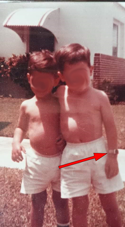 Me-as-kid-with-watch.jpg